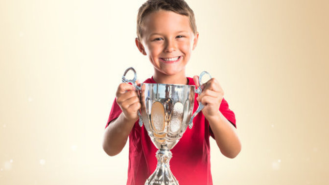 Do you think giving every kid a trophy inhibits their sense of competition and accomplishment?