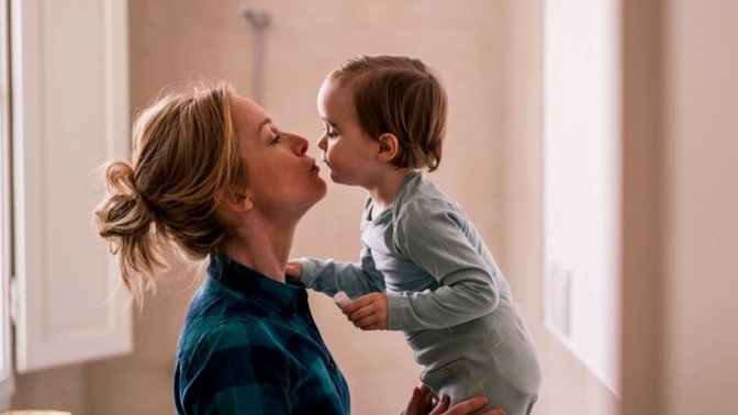How much does a woman value decreases in the dating game once she has a child?
