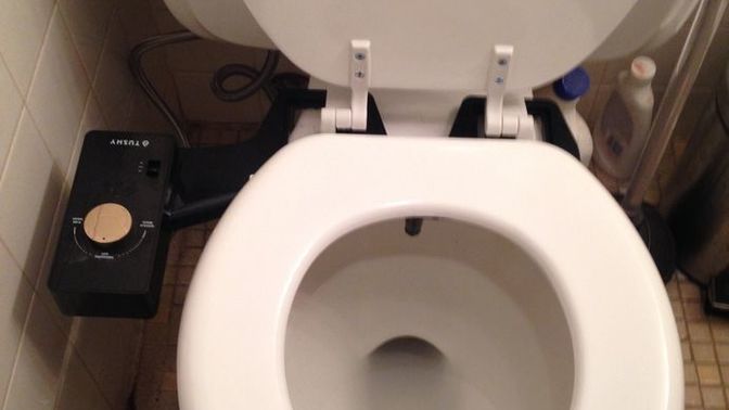 Why do people go to the toilet while the toilet seat is down?