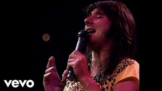 Why is Steve Perry dressed as a woman here?