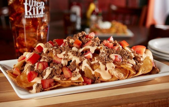 Who has better and more tasting food menu choices. Tilted Kilt or Twin Peaks restaurant?