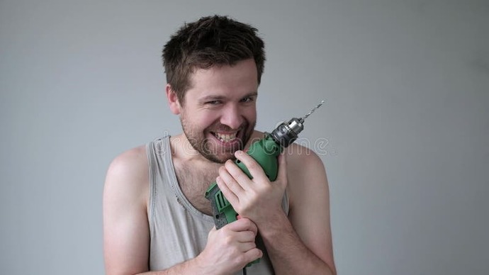 What would you think if you saw some guy casually walking down the street with a drill in his hand and a creepy smile on his face?