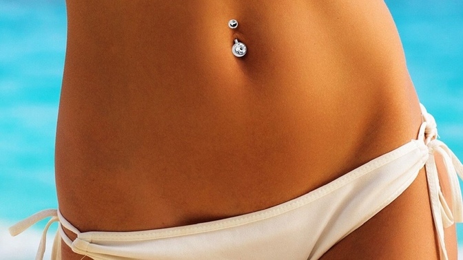 How to tell a girl that her belly button piercing is cute and looks hot on her if you notice it as she’s near walking or running?