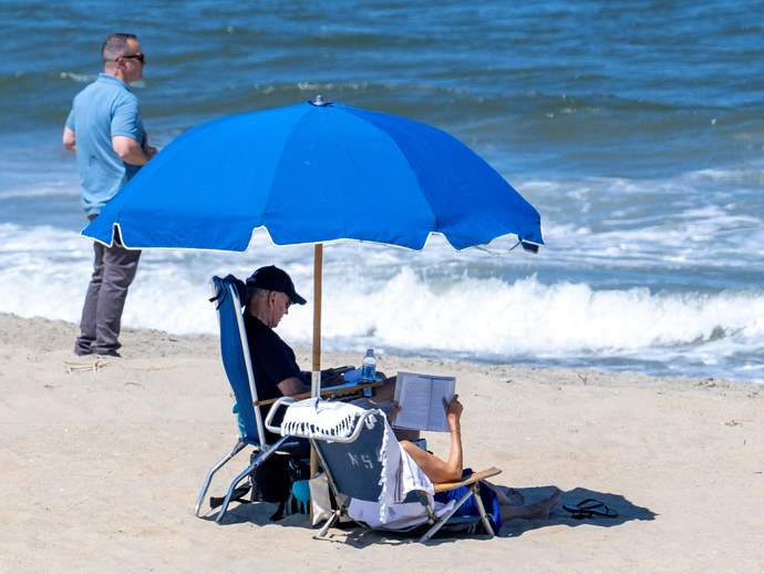 What type of person can just sit on the beach knowing he was responsible for leaving American families behind enemy lines in Afghanistan?