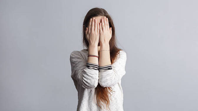 Why does a girl always attract shy guys? Which qualities make her particularly appealing to those men?