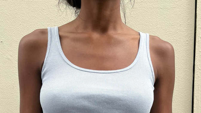 Guys, do you like women in tank tops? Which one would suit pale skin and platinum hair the most?