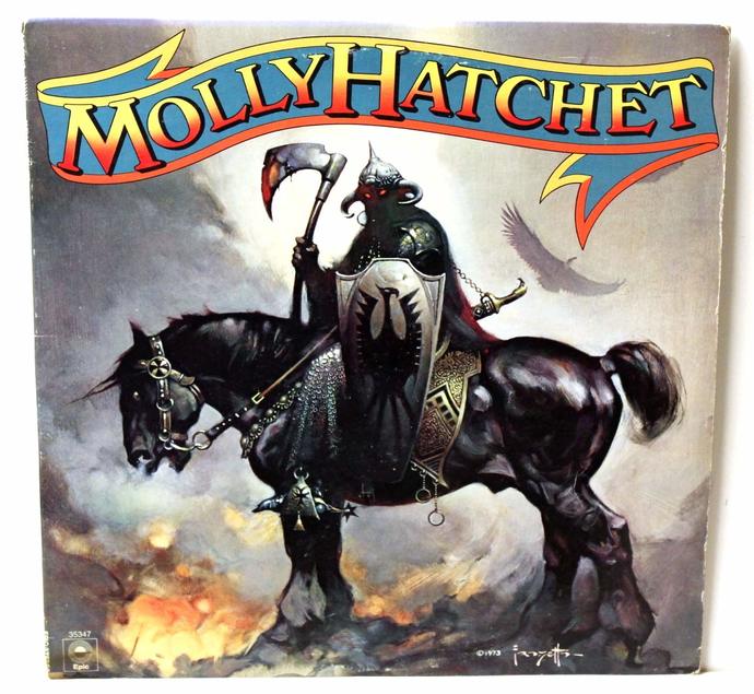 Growing up, did you have any posters on your wall? If so, what were they of?