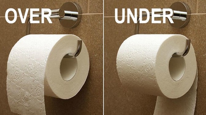 Is there a correct way to place the toilet paper in the dispenser?