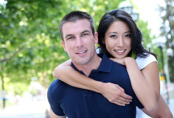 How are some Asian women as well as Mexican or (Dark-Skinned ones at least), able to get an American WHITE guy to marry them and have babies?