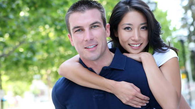 How are some Asian women as well as Mexican or (Dark-Skinned ones at least), able to get an American WHITE guy to marry them and have babies?