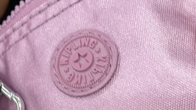Is the color of this wallet pink, purple or violet?