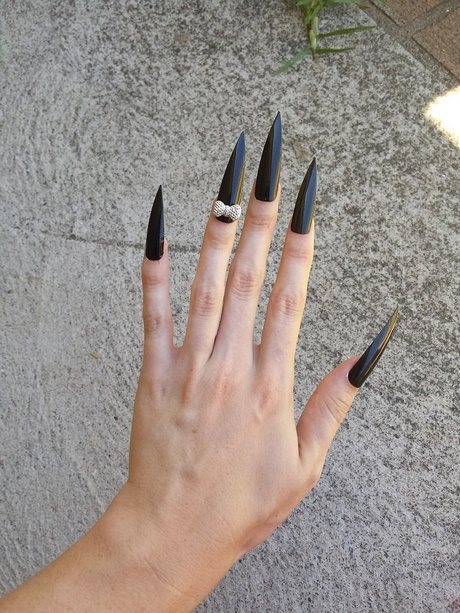 Is it normal for a guy to have long nails?