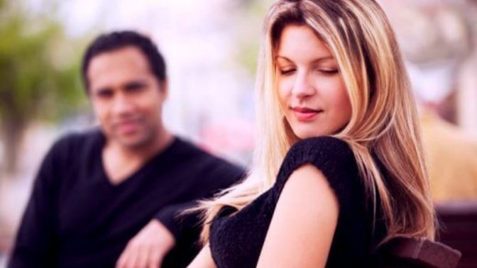 Does a woman play hard to get when she likes you?