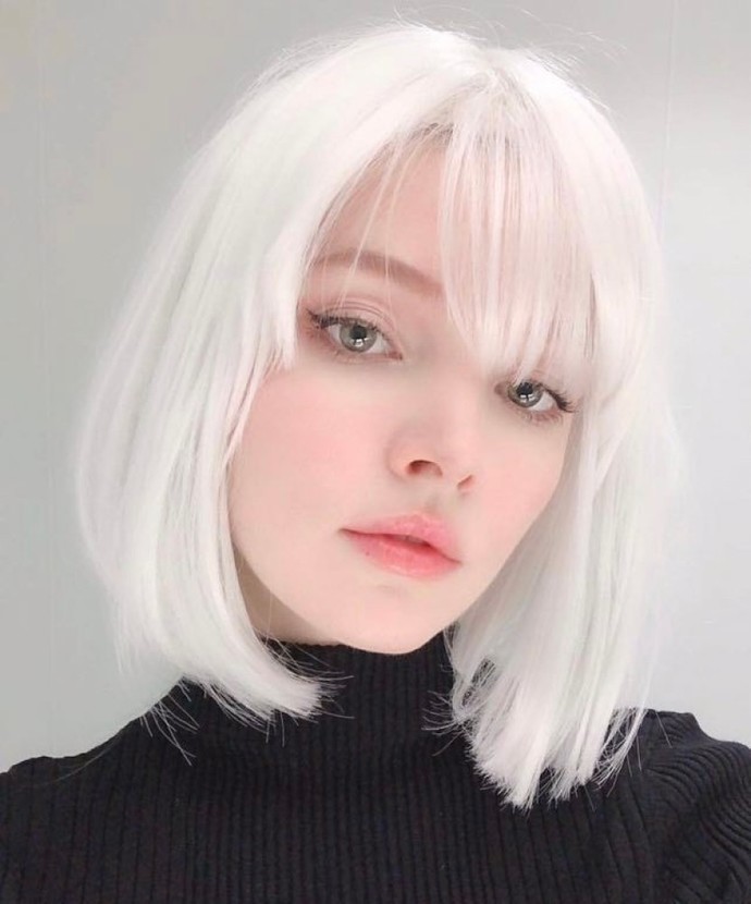 Does dyed white hair on a young woman look good to you?