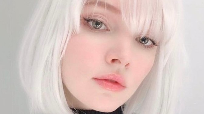Does dyed white hair on a young woman look good to you?