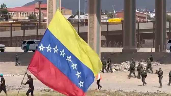 If "Migrants" flooding the US border are fleeing their country in fear for their lives, why are they flying THEIR country's flag and NOT the USA Flag?