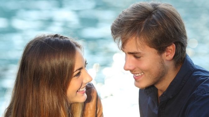 What are some body language signs that he’s interested in you when having a conversation?