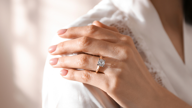 She wore the ring - but she did not say yes and said its definitely not a no but a maybe- what does this mean?