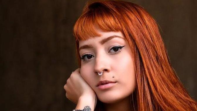 Guys, would you find a woman with a upper lip piercing, neck tattoo and a small face tattoo unattractive?