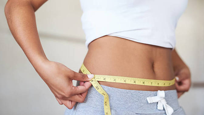 How do you keep your tummy flat?