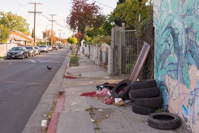How would you describe your general feeling when driving through a poor neighborhood or area of your city?