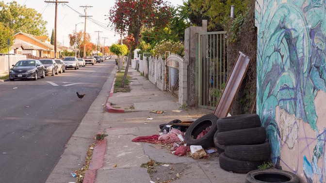 How would you describe your general feeling when driving through a poor neighborhood or area of your city?