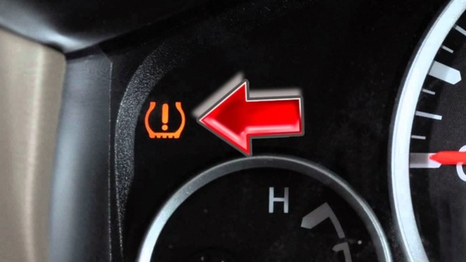 What do you do when your car's TIRE PRESSURE WARNING light comes on?