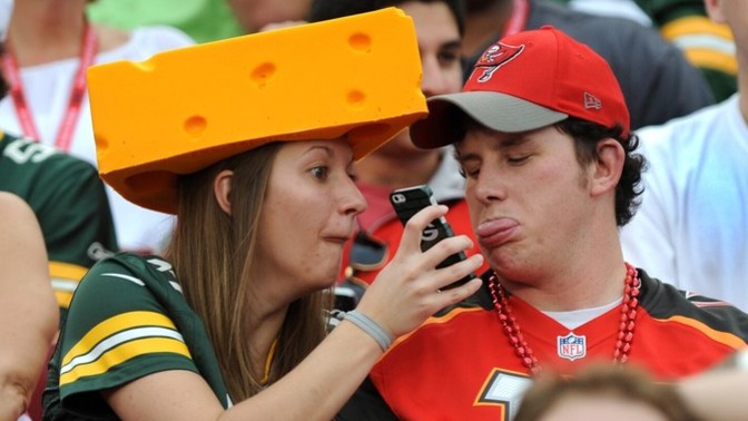 When a woman says she loves Football does she really or does she not want you having fun with your friends without her?