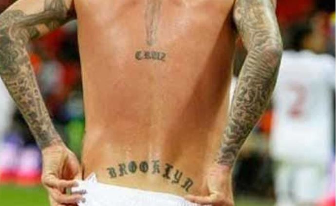Can a guy get a tramp stamp tattoo?