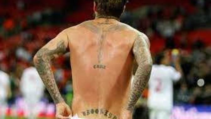 Can a guy get a tramp stamp tattoo?