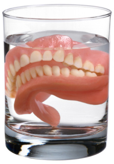 What has a lot of teeth, but still cannot bite?