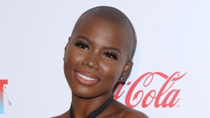 Is a bald by choice woman... attractive?