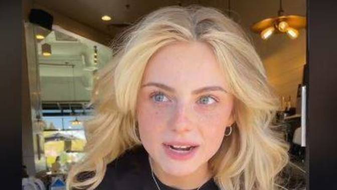 Do you think this girl's eye colour is blue?