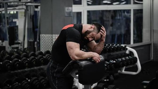 What are the potential risks associated with overtraining in a fitness regimen?