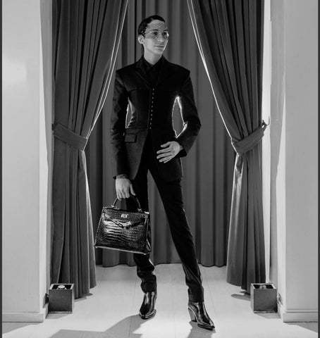 Can you name a person who bats for the other team but you are still attracted to them?