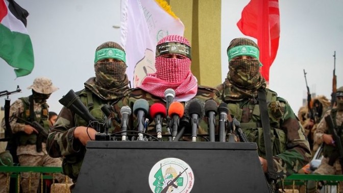 What does it say about Hamas that they hide behind masks?