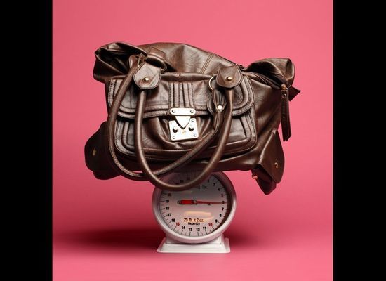 Why is lifting the purses that some of us carry the equivalent of working out at the gym?