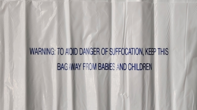 Who pays attention to the WARNING on PLASTIC BAGS?