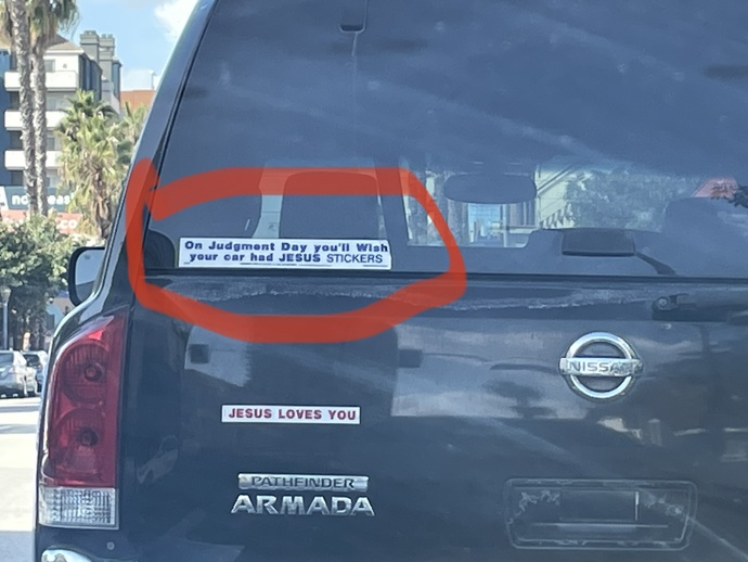 Do YOU agree with this bumper sticker on the back of this SUV?