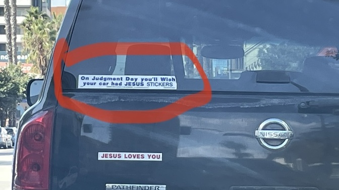 Do YOU agree with this bumper sticker on the back of this SUV?