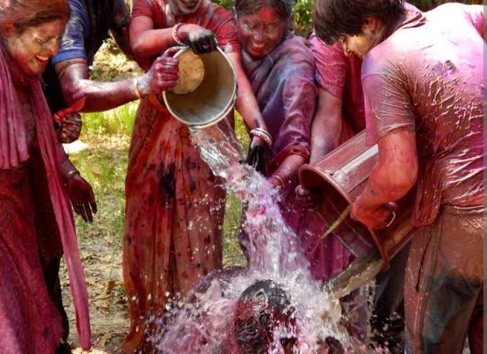 Girls and guys,  Do you love playing with colors in holi festival?
