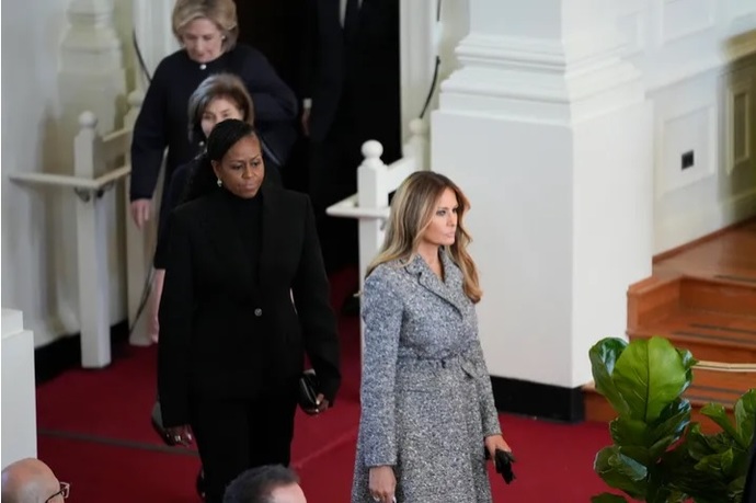 Who wears GREY to a funeral?