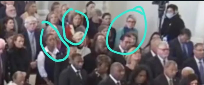 Who wears GREY to a funeral?