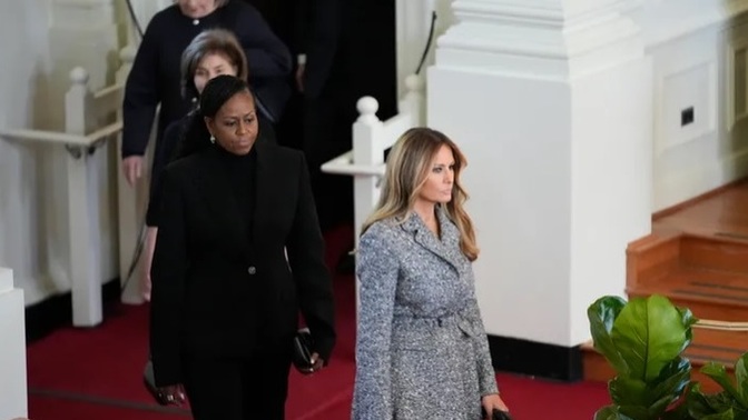 Who wears GREY to a funeral?