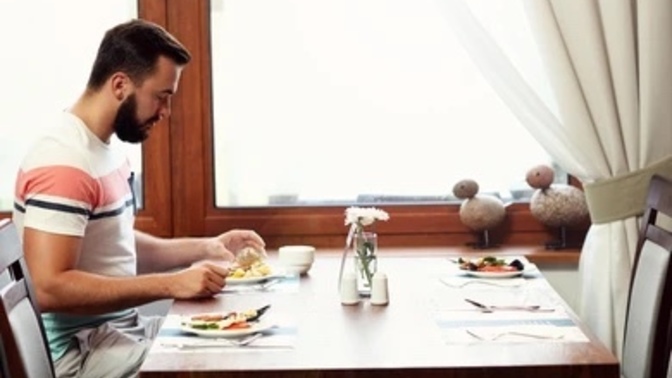 Is it out of the norm for women to eat by themselves at restaurants?