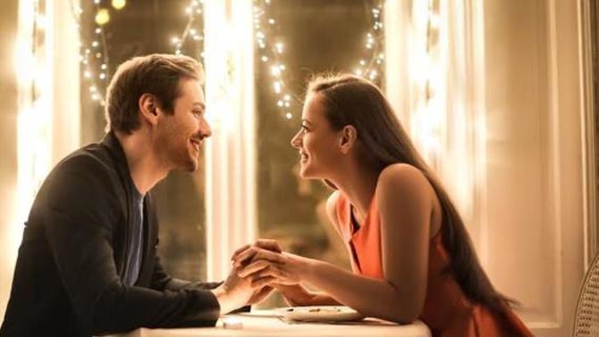 How can one strike a balance between being authentic and making a good impression on a first date?
