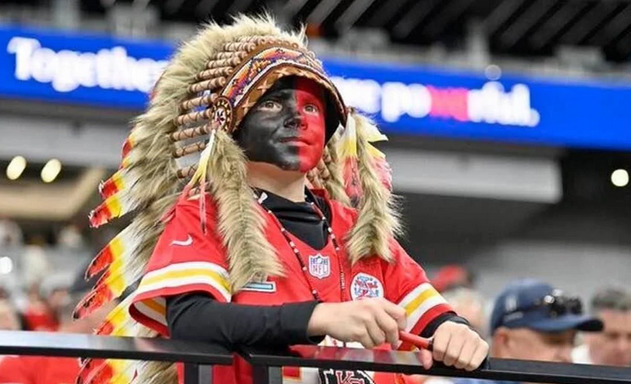 How much of a POS do you have to be to go after a 9 year old child for dressing up for a football game?