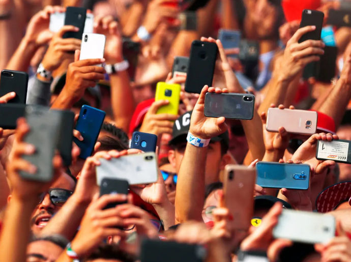 Why when I see or pass by my crush he is on phone?