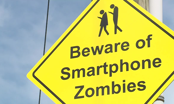 Why when I see or pass by my crush he is on phone?