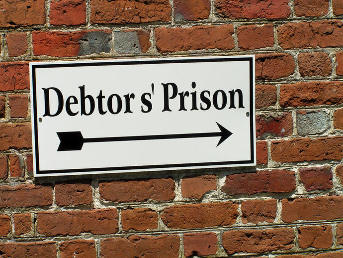 Someone blatantly decides to drive without insurance and causes an accident. Should they be forced into a debtors prison?